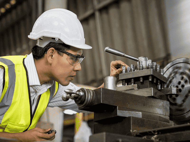 Understanding Instrumentation Certifications - Man inspecting machinery